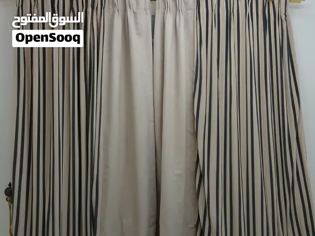 Tow beige curtains blackout for 6 riyals
