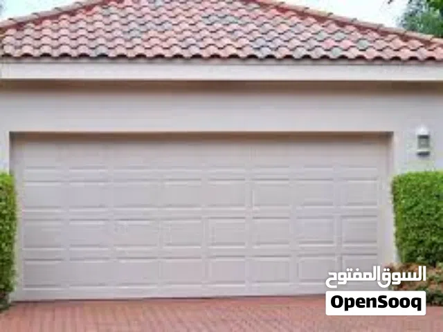 Garage Doors (Sectional Overhead Doors) U S A DOOR,( PARKING DOOR) ROLLING SHUTTERS NEW & REPAIRING.