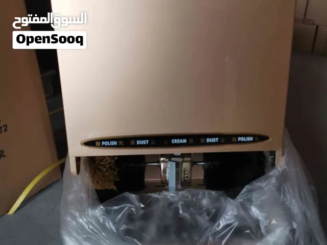 Shoe polishing machines