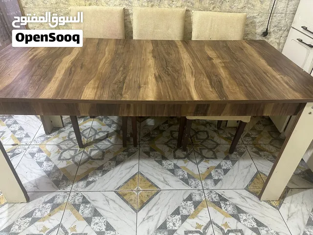 ميز طعام خشب مع 3كراسي  السعر 90 الف وبي مجال