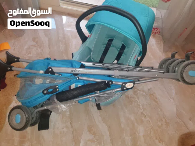 للبيع عربه خفيفه الوزن قابله للطي ماركه جونيور+كرسي طعام