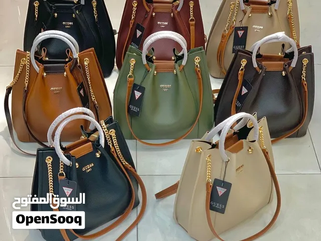 شنتة Guess الاصلية  صناعة تركية 100%  جلد اصلي وجودة عالية جدا