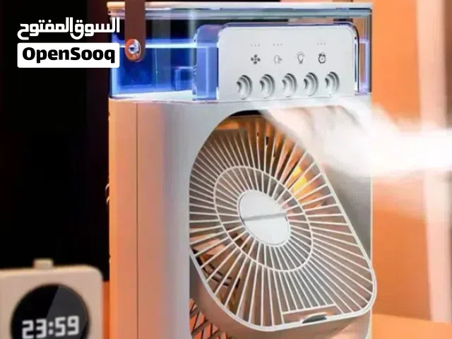 مروحة محمولة مع رذاذ بارد دون بلل أو رطوبة. منتج جدبد غير مستخدم منفع للطيور او الاماكن المغلقة