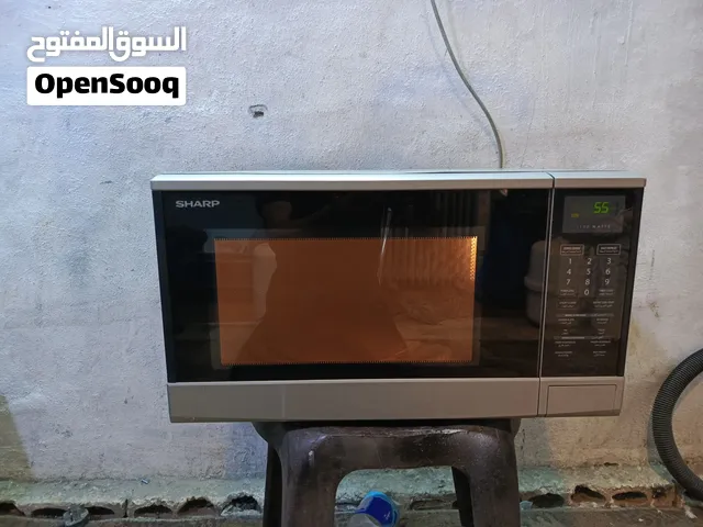 ميكرويف شارب لون سلفر 40لتر مستعمل بحال الوكاله نظيف شغال ميه بالميه قابل للتفاوض يوجد توصيل