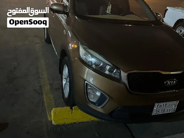 كيا سورينتو 2016 لون بني ممشى 305000 الف