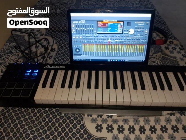 MIDI keyboard and MacBook laptop