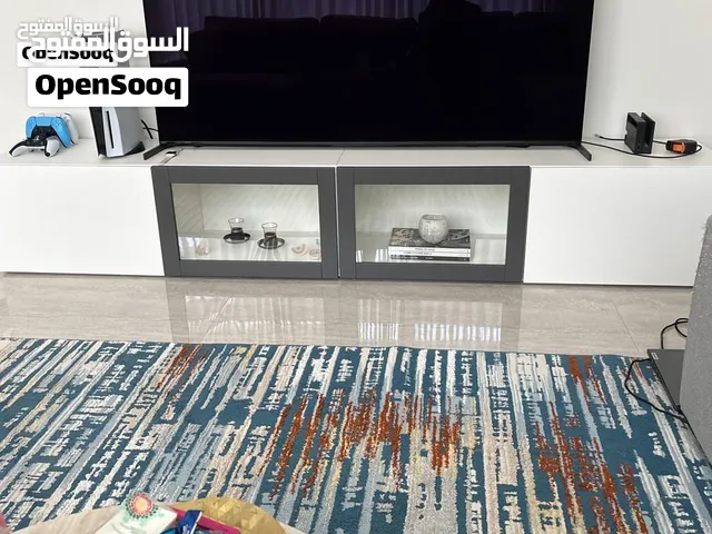 white and dark grey TV table