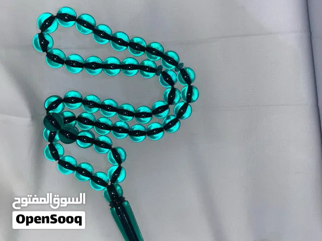 مسبحة أكريليك فاخرة ذات تصميم أنيق ولون أخضر شفاف