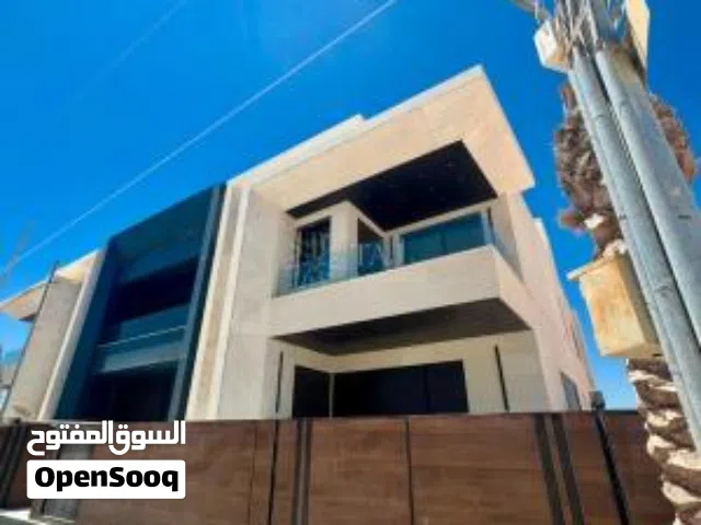 فيلا متلاصقة فاخرة للبيع في حجرا مطلة على كوريدور عبدون