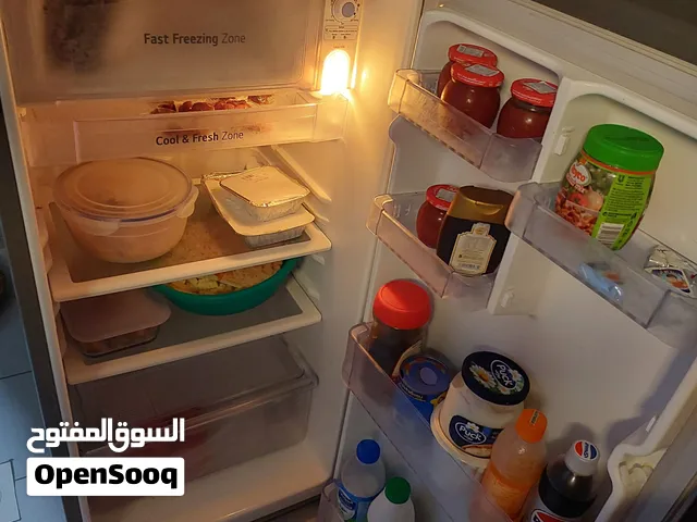 a month used LG fridge for sale.120 litres plus 10 years warranty.       .