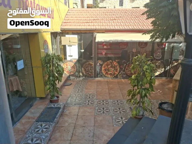 مطعم للبيع ×مع عدد بيتزا وسناكات - فرن - بجانب حلويات نفيسه - الدوار الثاني