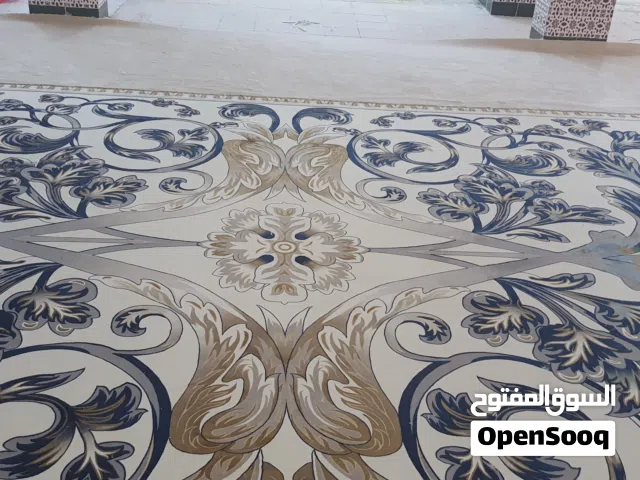 فرش المجالس بواسطة الشريط اللاصق البدر للمفروشات الرواد في سجاد المساجد التركي والايراني والمجالس