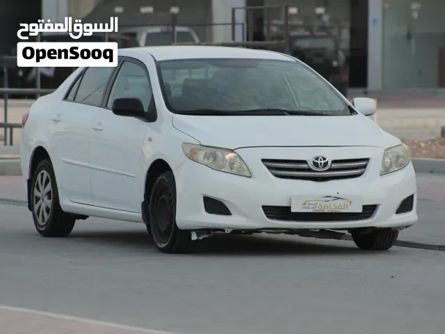 لون ابيض للبيع  تويوتا كورولا 2010