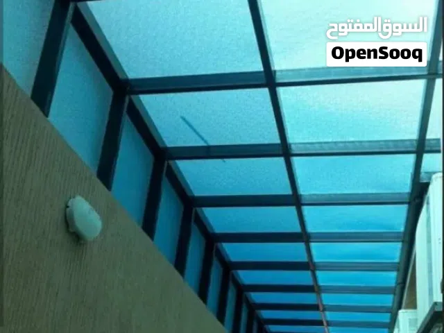 مظلات زينكو احمر  وبولي كربون للحماية السيارات  من البرد المتساقط في الشتاء