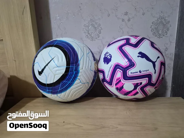 Puma and Nike Premier League Football