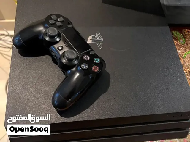 Sony PlayStation 4 pro 1 tb with  2 DualShock 4 Controllers- perfect Condition