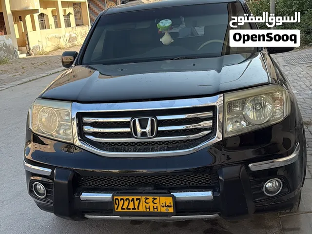 هوندا الدفع الرباعي بايلوت