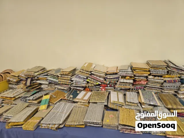 أربطة ملابس كاملة بـ 500 بيسة.. عباية بـ 5 ريالات