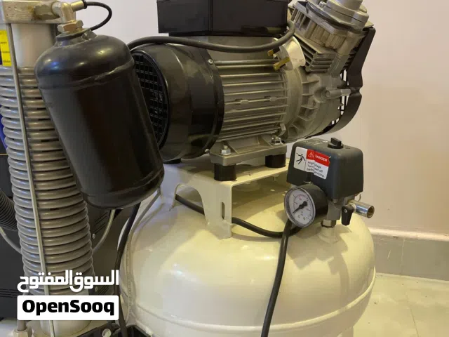 كمبريسور سرير الأسنان وجهاز الشفط