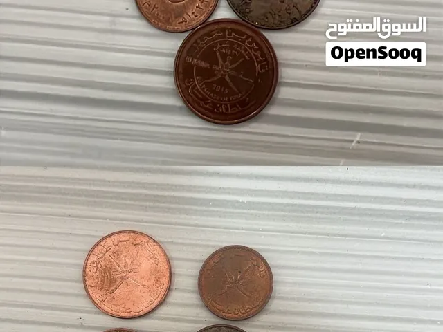 عملات معدنيه عمانيه قديمه اقرأ الوصف