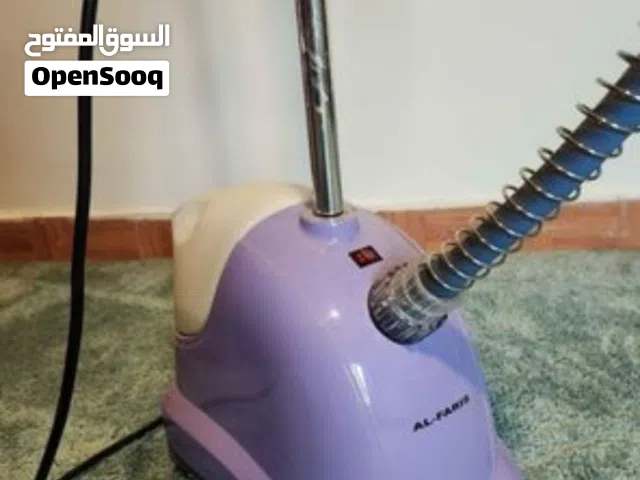 مكواة بخار عامودية