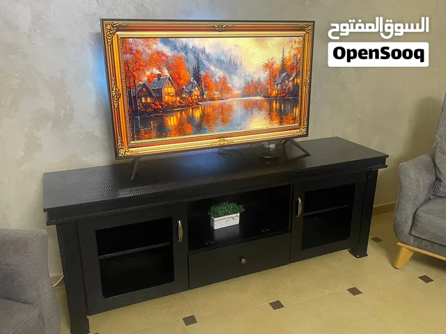 مزنون مستعمل للبيع بسعر مغري ( طاولة تلفاز)