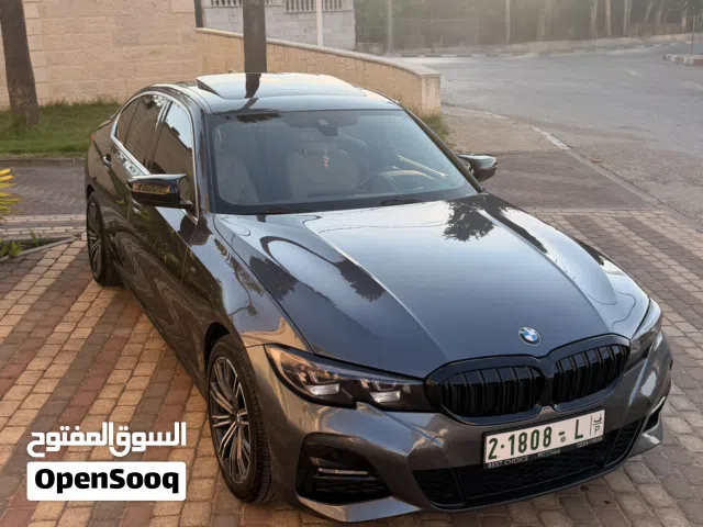 Bmw 330e plug in  2020 رخصة  فحص نخب  m package رخصة و تامين  امكانية البدل وارد مع فرق بسعر