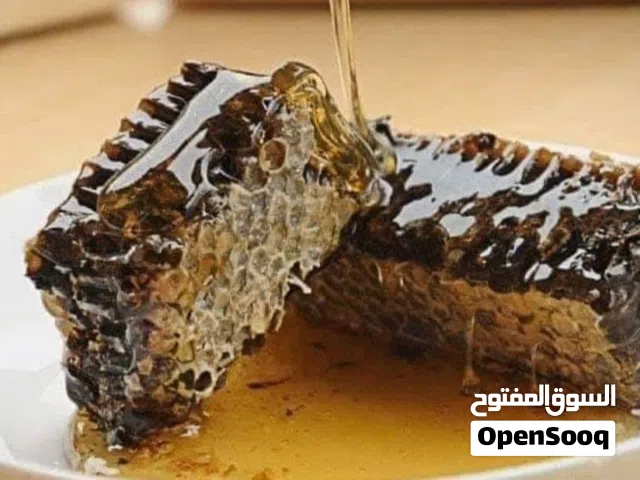 عسل طبيعي 100 ٪بإذن الله تعالى عسل بشمعه شمع عسل عسل السدر عسل جبلي عسل حمضيات.