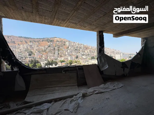 وحدة جنوبية شرقية في موقع استراتيجي على شارعي فيصل والحرية - فرصة استثمارية وسكنية مميزة