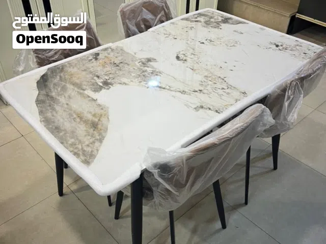 طاوله طعام سرميك 4 كراسي
