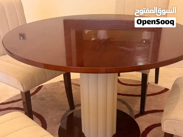Elegant Round Dining Table – Dark Wood