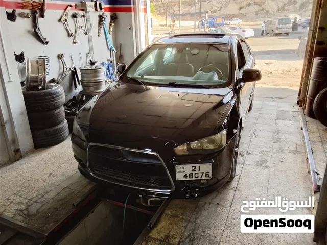 ميتسوبيشي لانسر gt اصلي فل كامل 2011 بحاله ممتازه