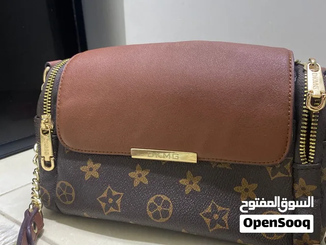شنطة أنيقة بني فخم بتصميم مميز