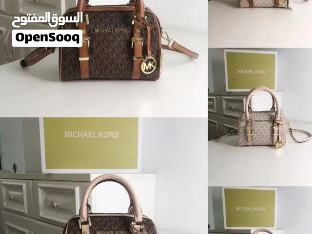 brown Michael Kors for sale  in Al Dakhiliya