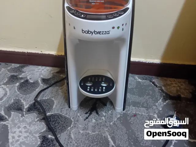 جهاز تحضير حليب الأطفال الأوتوماتيكي Baby Brezza Formula Pro Advanced باللون الأبيض والأسود شبه جديد