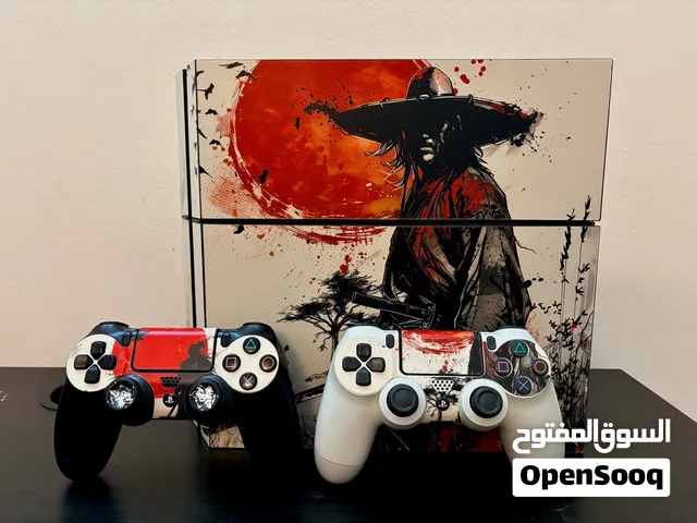 PS4 with 2 Controllers + Accessories – Excellent Condition