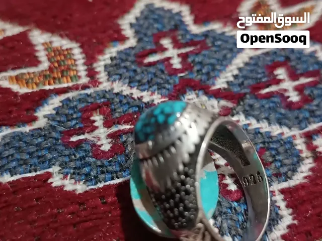 خاتم فيروزي من أصل معدني
