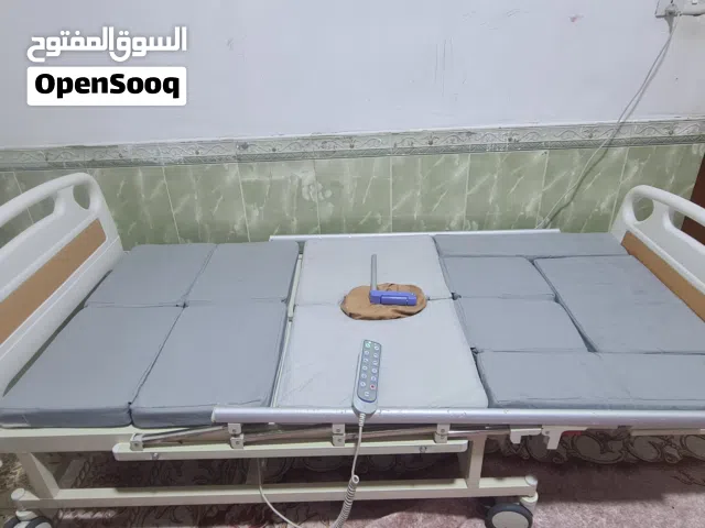 سرير طبي كهربائي