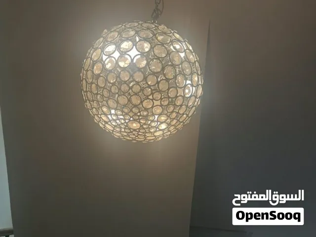 مجموعه اغراض للبيع تلفزيون وثريه وكرسي وستاير وزوليه