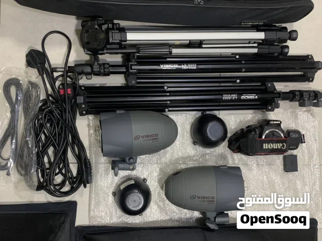 Studio lighting kit includes soft light boxes, stands, lamps, carrying case + one tripod camera