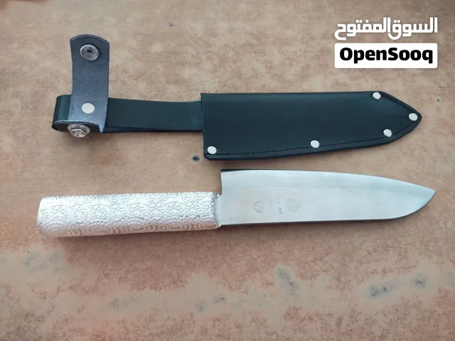 steeless steel knife with leather cover
