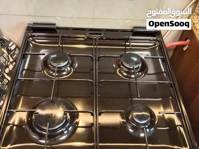 فرن أربعة رؤوس جميعها تعمل