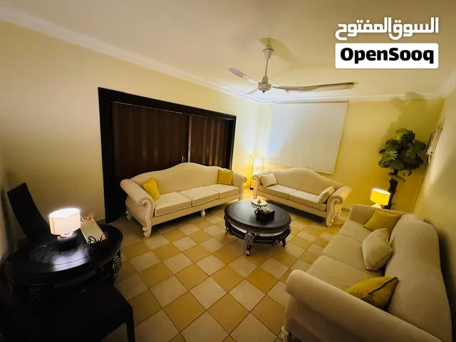 Drawing room sofa sets with tables and lamps plus additional small table set.