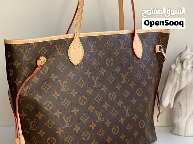 brown Louis Vuitton for sale  in Muscat