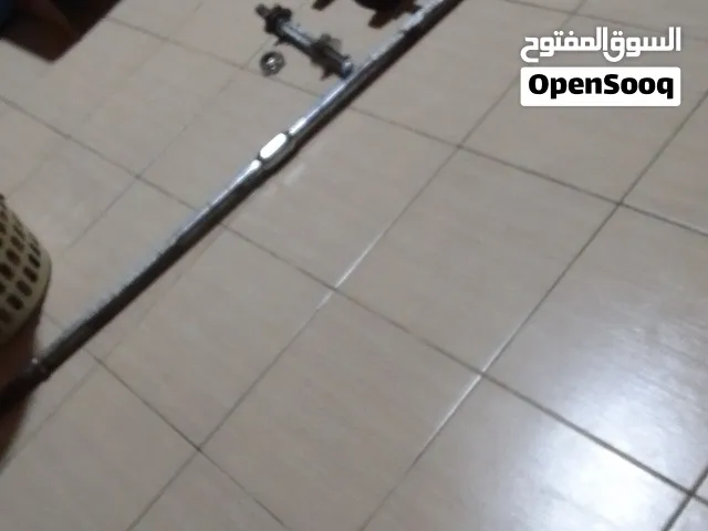 دنبلين وبار من غير اوزان البار وزنه خالي 20 كيلو