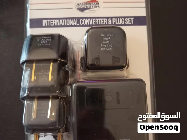 محول كهرباء دولي أو أمريكي متغير بالإضافة لعظمات كهرباء