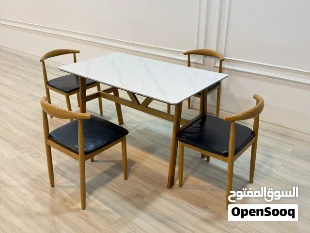 ميز طعام وكراسي حديثه