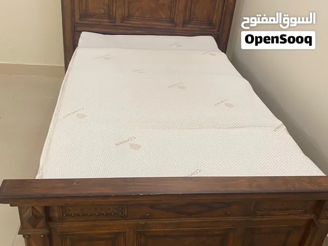 Wooden bed / سرير خشب