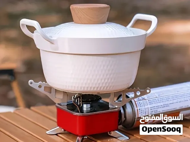 غاز لرحلات للتخييم والصيد عادةً بعبوات غاز البوتان المسال الصغيرة المتنقلة. مناسب جدا