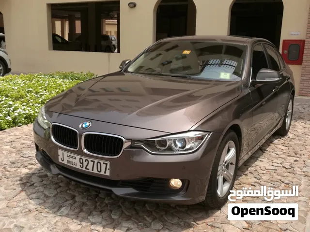BMW 320i  Brown on Beige  Full Option  Smooth Highway Mileage (Dubai–Abu Dhabi daily)